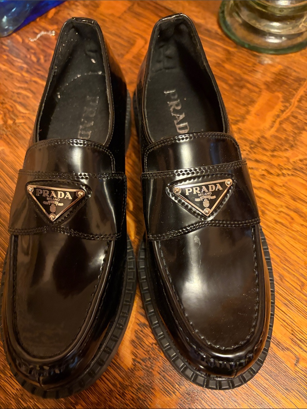 Prada Black Patent Leather womans Slip-On Loafers with Logo Plaque